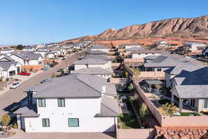Aerial view of residential area with a mountain backdrop