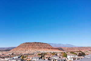 View of mountain backdrop with nearby suburban area