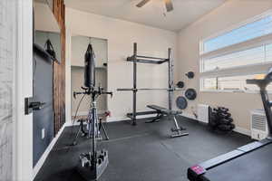 Workout area with rubber floors and ceiling fan