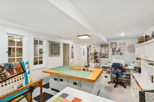 Rec room with a desk