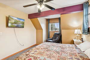 Bedroom with carpet floors and ceiling fan