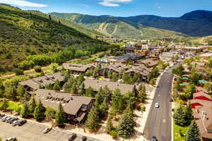 Aerial perspective of suburban area featuring mountains