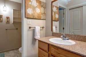 Bathroom featuring vanity and light tile patterned floors