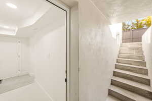 View of walk-out basement entry