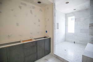 Full bathroom with a walk in shower