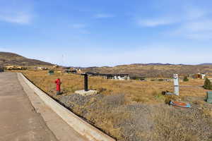 View of yard with a mountain view