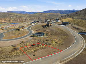 View of property location with a mountain backdrop and property parcel outlined