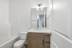 Full bathroom featuring vanity and tub / shower combination