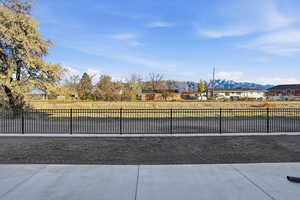 View of yard featuring a residential view and a mountain view