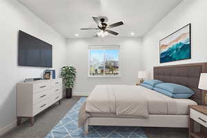 Bedroom with carpet flooring, ceiling fan, and recessed lighting