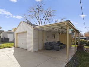 Detached garage featuring driveway