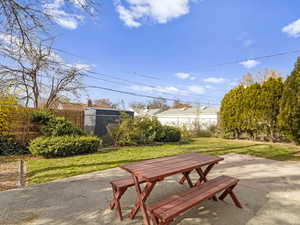 View of patio with outdoor dining area