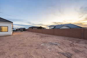 View of yard at dusk