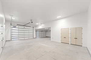 Garage featuring baseboards