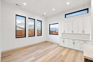 Interior space featuring light wood finished floors and recessed lighting