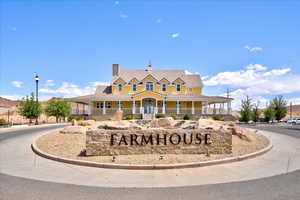Farmhouse inspired home featuring a chimney and covered porch