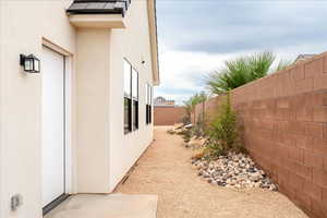View of fenced backyard