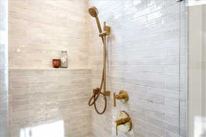 Bathroom view of a tile shower