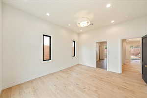 Unfurnished bedroom featuring recessed lighting and light wood-type flooring
