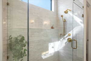 Full bath featuring a stall shower