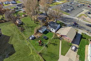 View of property location with nearby suburban area