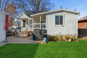 Rear view of house with a porch
