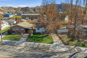 Aerial view of residential area with mountains