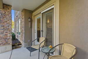 Balcony featuring a sunroom