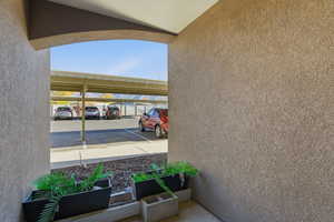 View of partially covered parking lot