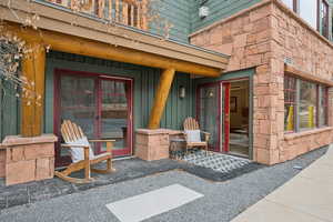 Entrance to property with board and batten siding