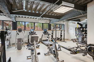 Exercise room with a wall unit AC