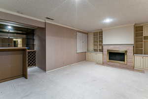 Features dry bar, fireplace, laundry room and third bedroom