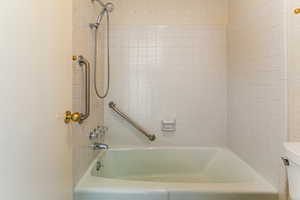 Bathroom featuring bathtub / shower combination