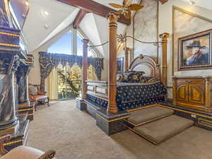 Bedroom featuring beam ceiling, carpet floors, high vaulted ceiling, and access to outside