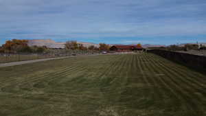 View of yard featuring a mountain view and a view of rural / pastoral area