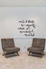 Living area featuring carpet