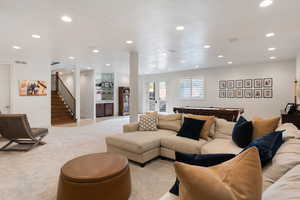 Living area with bar area, carpet floors, recessed lighting, pool table, and stairway