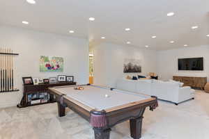 Rec room featuring light carpet, recessed lighting, and billiards table