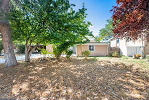 View of front of property featuring stucco siding