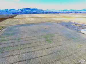 View of rural area featuring mountains and abundant farmland