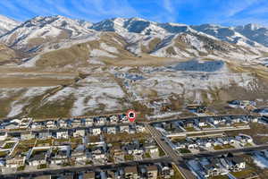 View of property location with nearby suburban area and a mountainous background