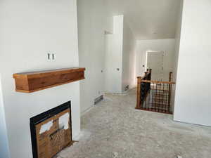 Hall featuring an upstairs landing