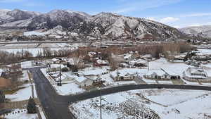 View of mountain background featuring nearby suburban area
