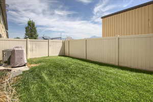 View of fenced backyard