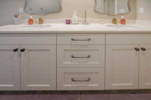 Bathroom featuring double vanity