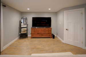 Bedroom featuring recessed lighting and light wood-style floors