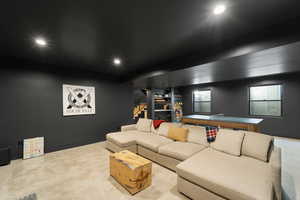 Carpeted cinema room featuring recessed lighting