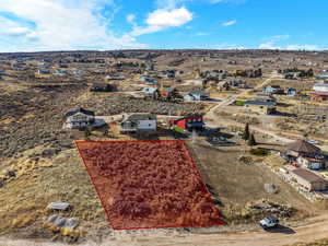 View of rural area with property boundaries highlighted and a desert landscape