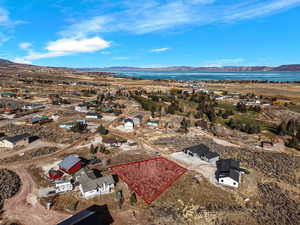 Aerial view of property's location with property boundaries highlighted and a water and mountain view