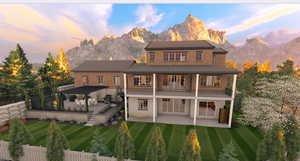 Back of property at dusk with a patio area, a mountain view, and brick siding